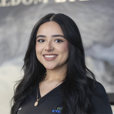 A headshot of Estrellita, an Optician at Freedom Eye Care.